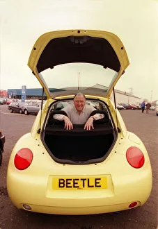 Comedian Andy Cameron April 1999 sitting inside a Volkswagen Beetle Comedian Andy Cameron April 1999 sitting inside a Volkswagen Beetle