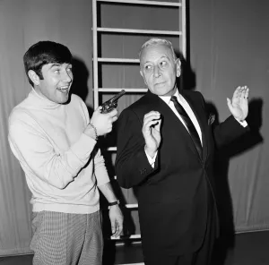 Comedian Jimmy Tarbuck with George Raft at the Palladium. 31st October 1965 Comedian Jimmy Tarbuck with George Raft at the Palladium. 31st October 1965