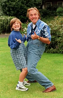 Comedian Rik Mayall and his son Sidney pulling funny faces. 12th September 1998 Comedian Rik Mayall and his son Sidney pulling funny faces. 12th September 1998