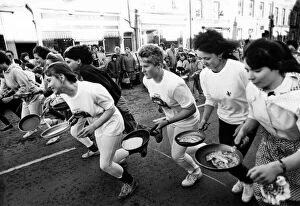 Images Dated 16th February 1988: Competitors take part in the Alnwick Shrove Tuesday Pancake race 16 February 1988