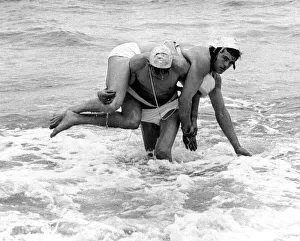 Two Competitors in the heats of the Nation Lifeguard Championship held on the South Two Competitors in the heats of the Nation Lifeguard Championship held on the South