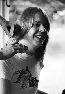 Composer Rick Wakeman having his hair cut. August 1974 P007277 Composer Rick Wakeman having his hair cut. August 1974 P007277