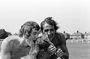 Cooling off after training in a heatwave are Leicester City footballers Steve Kember Cooling off after training in a heatwave are Leicester City footballers Steve Kember