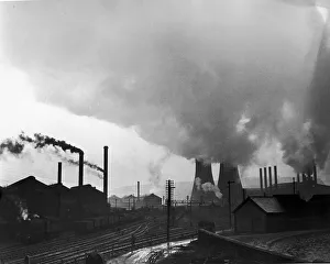 Cooling towers and smoking chimneys pollute the air at a Sheffield industrial site Cooling towers and smoking chimneys pollute the air at a Sheffield industrial site
