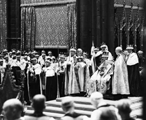 Coronation of King George VI 12th May 1937. King George VI is passed one of the two Coronation of King George VI 12th May 1937. King George VI is passed one of the two