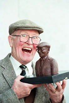 Coronation Street actor Bill Waddington with a chocolate bust of his character Percy Coronation Street actor Bill Waddington with a chocolate bust of his character Percy