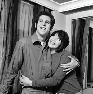 Couple embracing with the woman looking up to the man. December 1969 Z11624 Couple embracing with the woman looking up to the man. December 1969 Z11624