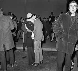 A couple kiss to celebrate New Year in Manchester. December 1969 Z12558-002 A couple kiss to celebrate New Year in Manchester. December 1969 Z12558-002