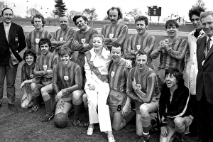 Coventry carnival queen, Melanie Greasley (16), poses with The Entertainers XI football Coventry carnival queen, Melanie Greasley (16), poses with The Entertainers XI football
