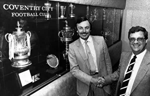 Coventry City Chairman John Poynton (right) shakes hands with City vice-president Graham Coventry City Chairman John Poynton (right) shakes hands with City vice-president Graham