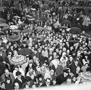 Crowds gather in the rain to catch a glimpse of Prime Minister Harold Wilson (1916 - 1995 Crowds gather in the rain to catch a glimpse of Prime Minister Harold Wilson (1916 - 1995