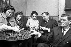 Cubbington personality girl Miss Susan Rogers pushed over a pile of pennies built Cubbington personality girl Miss Susan Rogers pushed over a pile of pennies built