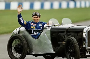 Damon Hill at the wheel of a 1930 Austin Seven Racing Car at Donnington Race Track Damon Hill at the wheel of a 1930 Austin Seven Racing Car at Donnington Race Track