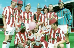 Dave Bassett and the players of Sheffield United seen here celebrating an early Dave Bassett and the players of Sheffield United seen here celebrating an early
