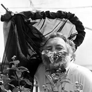 Images Dated 23rd July 1985: David Bellamy with an Atlas moth at Stratford-upon-Avon Butterfly house. 23rd July 1985