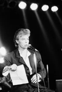 David Bowie seen here singing at the press conference to announce the details of his David Bowie seen here singing at the press conference to announce the details of his