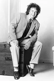 David Essex Singer sitting on blanket chest David Essex Singer sitting on blanket chest