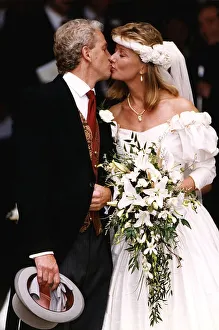 David Gower former cricket player kisses his new bride Thorrun Nash on the lips at their David Gower former cricket player kisses his new bride Thorrun Nash on the lips at their