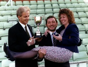 David Gower former England Cricket Captain holds cup presented to Trevor Clifford David Gower former England Cricket Captain holds cup presented to Trevor Clifford