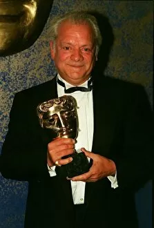Images Dated 29th April 1997: David Jason holding his Bafta award he received for Best Comedy Performance