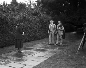 David Lloyd George at Chequers Court. Lady Greenwood taking a photograph of Mr Lloyd David Lloyd George at Chequers Court. Lady Greenwood taking a photograph of Mr Lloyd