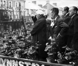 David Lloyd George taking the salute at the Eisteddfod. Also in the picture are Mr R O David Lloyd George taking the salute at the Eisteddfod. Also in the picture are Mr R O