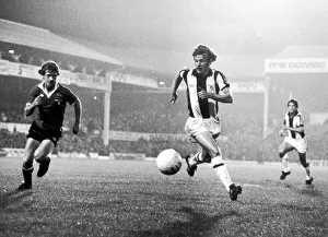 David Mills attacking the Manchester United goal area with Jimmy Nicholls in pursuit David Mills attacking the Manchester United goal area with Jimmy Nicholls in pursuit