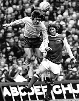 David Nish of Derby County heads the ball from Alan Ball of Arsenal during their league David Nish of Derby County heads the ball from Alan Ball of Arsenal during their league