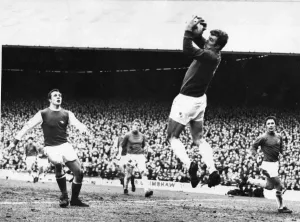 Davies, the Cardiff City goalkeeper gathers the ball as Arsenal' Davies, the Cardiff City goalkeeper gathers the ball as Arsenal'