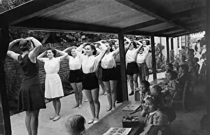 On one day a week, mothers collecting their children at the Dorking wartime nursery On one day a week, mothers collecting their children at the Dorking wartime nursery