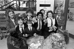 Deighton High School pupils are pictured presenting 1,000 aluminium cans to Diane Lodge Deighton High School pupils are pictured presenting 1,000 aluminium cans to Diane Lodge