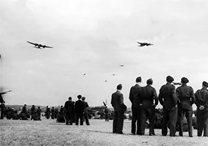 A demonstration by Mosquito fighters and Mustangs during an air display at a Royal A demonstration by Mosquito fighters and Mustangs during an air display at a Royal