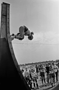 Demonstration of skateboarding skills on the half pipe at the Cambridge Skatepark Demonstration of skateboarding skills on the half pipe at the Cambridge Skatepark
