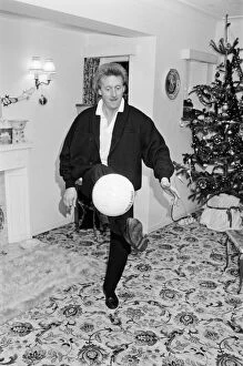 Images Dated 30th December 1987: Denis Law, at home over Christmas in 1987. Denis Law CBE
