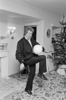Images Dated 30th December 1987: Denis Law, at home over Christmas in 1987. Denis Law CBE