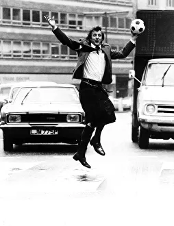 Denis Law wearing kilt in Regent Street London 1978 hours before leaving with Denis Law wearing kilt in Regent Street London 1978 hours before leaving with