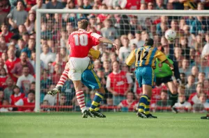 Dennis Bergkamp scores his second goal for his new club Arsenal Dennis Bergkamp scores his second goal for his new club Arsenal
