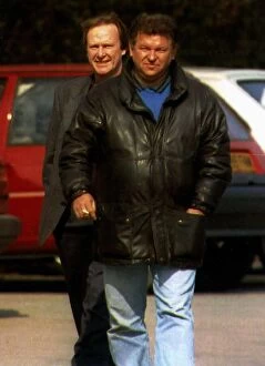 Images Dated 26th March 1993: Dennis Waterman shy Actor goes undercover behind a minder while filming in Leeds Roman