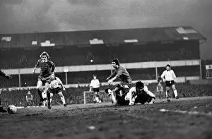 Images Dated 12th January 1975: Derby County (2) v. Liverpool (0). Davies ends in mud after (above)