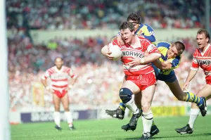 A desperate Warrington defence tries to prevent the Wigan attack from scoring a try in A desperate Warrington defence tries to prevent the Wigan attack from scoring a try in