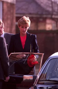 DIANA PRINCESS OF WALES GETTING INTO CAR OUTSIDE THE RED CROSS CENTRE IN NORTH LONDON DIANA PRINCESS OF WALES GETTING INTO CAR OUTSIDE THE RED CROSS CENTRE IN NORTH LONDON