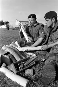 Dismantled Bomb. Members of Royal Army Ordanance Corps with Dismantled 50lb Bomb Dismantled Bomb. Members of Royal Army Ordanance Corps with Dismantled 50lb Bomb