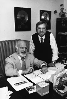 Don Arden Impresario with his son David in their office with Gold Records in the display Don Arden Impresario with his son David in their office with Gold Records in the display