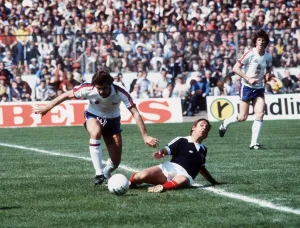 Don Masson 1978 Scotland v England football tackle on ground ESEuro Don Masson 1978 Scotland v England football tackle on ground ESEuro