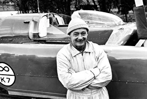 Donald Campbell leaning against Bluebird during a break in the test trials on Lake Donald Campbell leaning against Bluebird during a break in the test trials on Lake