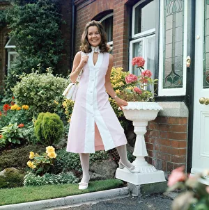 Dress designer Glynis Robins, 23, pictured wearing one of her own designs - a midi dress Dress designer Glynis Robins, 23, pictured wearing one of her own designs - a midi dress