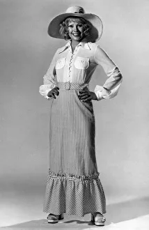 She is dressed for romance, and her own battle for Women's Lib She is dressed for romance, and her own battle for Women's Lib