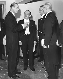 The Duke Of Edinburgh at a formal dinner talking with members of the French Chamber of The Duke Of Edinburgh at a formal dinner talking with members of the French Chamber of