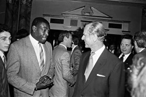 Images Dated 24th May 1988: Duke Of Edinburgh meets Frank Bruno at the Variety Club