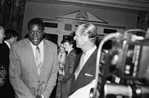 Images Dated 24th May 1988: Duke Of Edinburgh meets Frank Bruno at the Variety Club